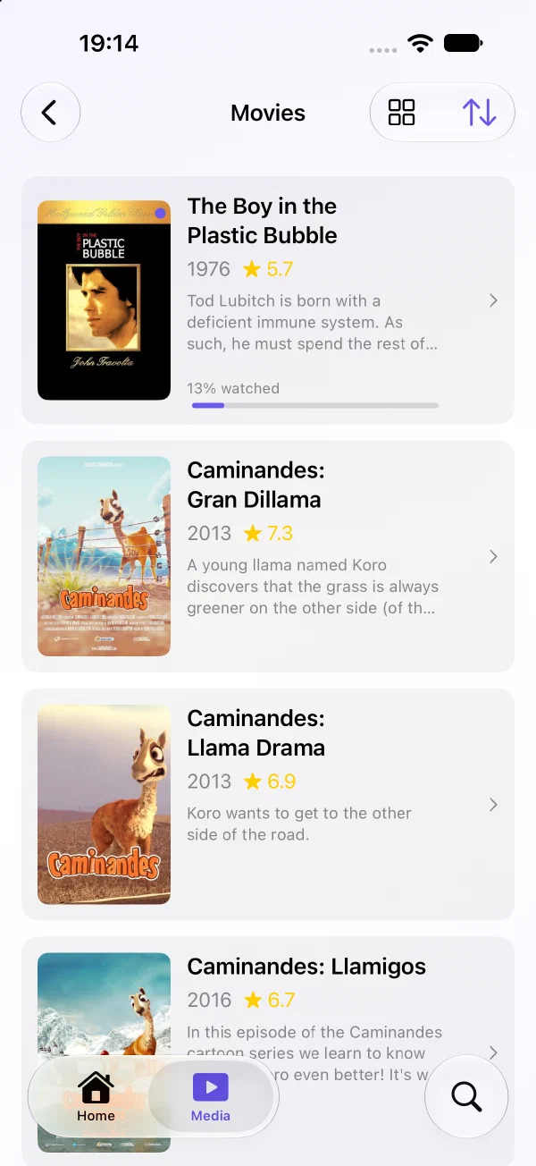 The current FinPlus movie library on iPhone, with film posters, titles and release years